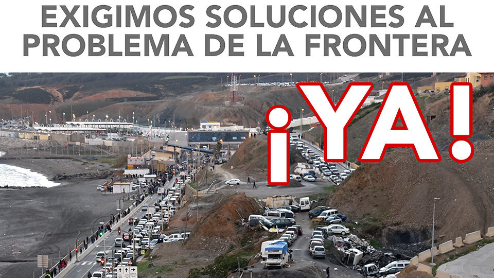 Detalle del cartel de la manifestación de empresarios y sindicatos para exigir soluciones al bloqueo de la frontera