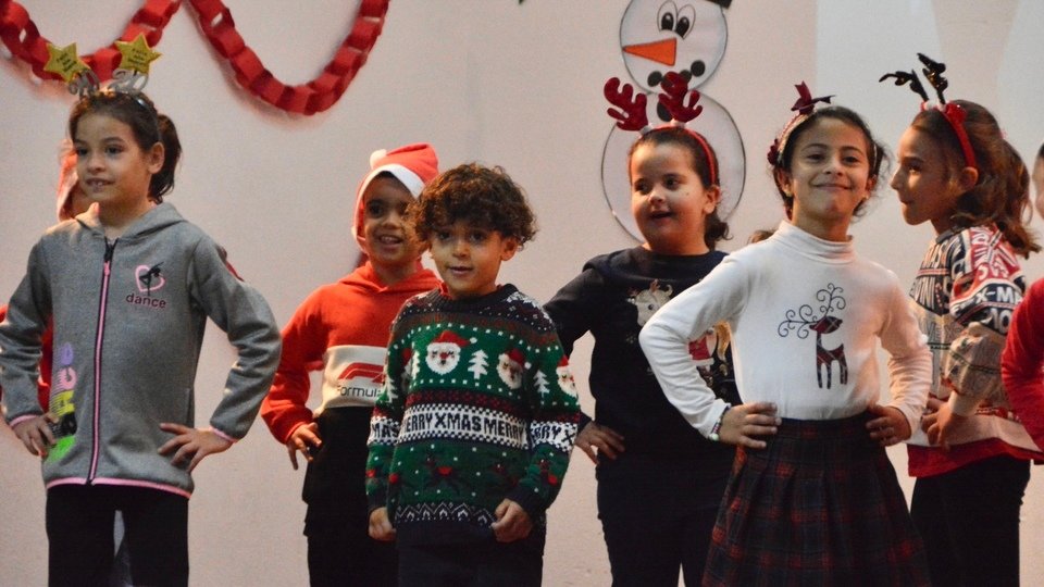 CEIP Juan Carlos I festival navideño navidad fiesta bailes villancicos niños primaria infantil