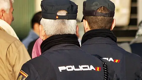 policias nacionales recurso espalda
