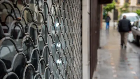 comercio crisis cerrado alarma tienda peq