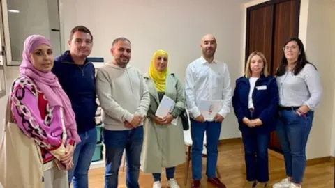 Miembros de MDyC y FAMPA 4 Culturas, tras una reuni&oacute;n